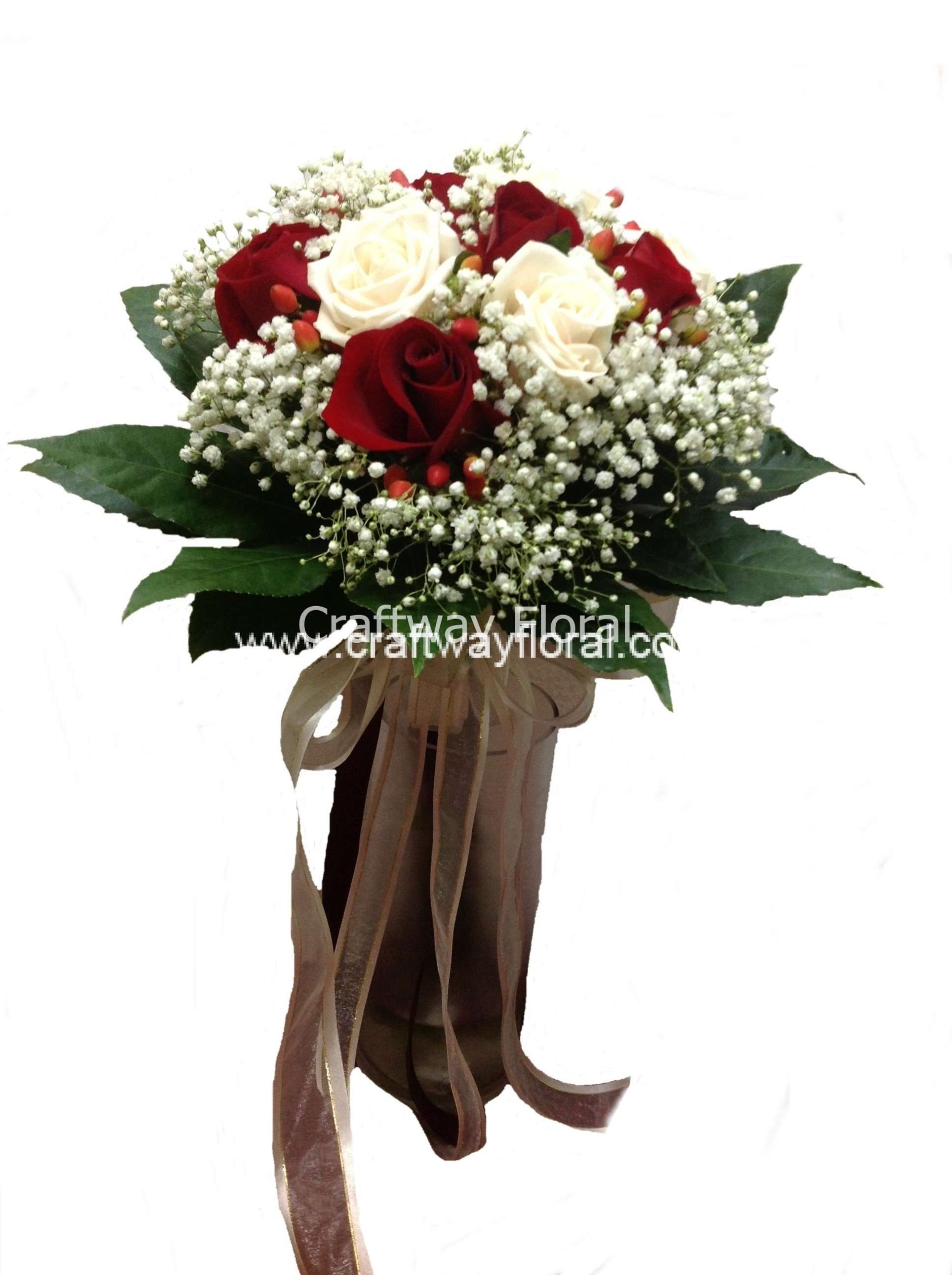 Rose Elegance Bouquet with red and white roses. Rose Elegance Bouquet: Red Roses, White Roses, Hypericums, White Baby's Breaths, and Lush Foliages.